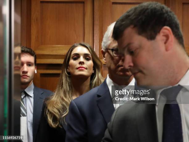 Former White House communications director Hope Hicks stands in an elevator before arriving at a closed-door interview with the House Judiciary...