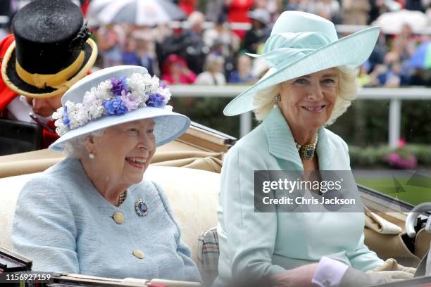 Queen Elizabeth II and Camilla, Duchess of Cornwall arrive in a horse carriage on day two of Royal Ascot at Ascot Racecourse on June 19, 2019 in...