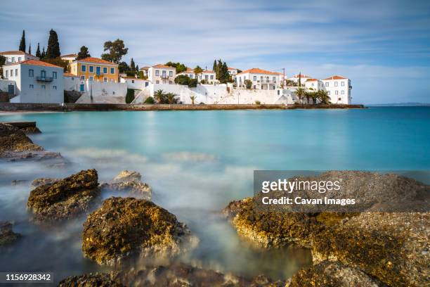 traditional architecture in spetses seafront, greece. - spetses stock pictures, royalty-free photos & images