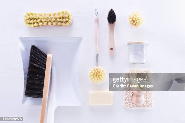 ecologically friendly brushes, cleaning rags, soap and baking soda - amenities stock-fotos und bilder
