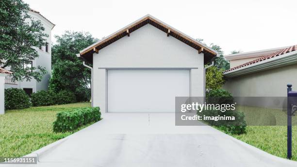 luxus-haus garage mit betoneinfahrt - garage door stock-fotos und bilder