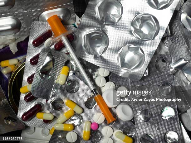 pharmaceutical waste - needle injury stock pictures, royalty-free photos & images