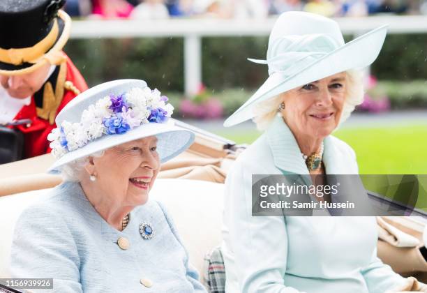 Queen Elizabeth II and Camilla, Duchess of Cornwall arrrive by carriage on day two of Royal Ascot at Ascot Racecourse on June 19, 2019 in Ascot,...