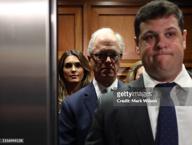 Former White House communications director Hope Hicks stands in an elevator prior to arriving at a closed-door interview with the House Judiciary...
