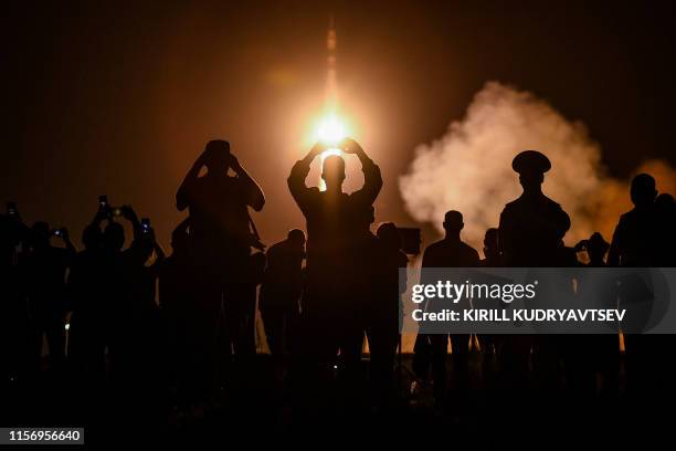 Russia's Soyuz MS-13 spacecraft carrying the members of the International Space Station expedition 60/61, NASA astronaut Andrew Morgan, Russian...