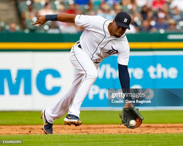 Jeimer Candelario of the Detroit Tigers makes a play on a ground ball in the fourth inning against the Toronto Blue Jays during a MLB game at...