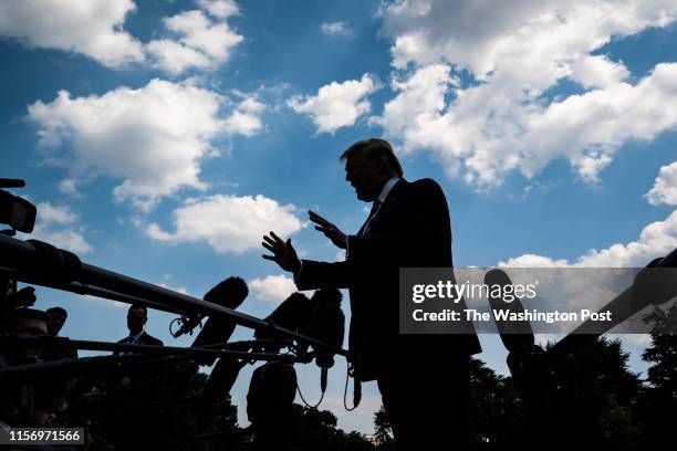 President Donald J. Trump stops to talk to reporters and members of the media as he walks from the Oval Office to board Marine One to depart from the...
