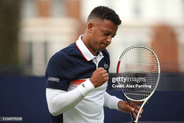 Jay Clarke of Great Britain celebrates a point during his First Round Singles Match against Lucas Pouille of France during day Three of the...