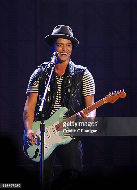Singer/guitarist Bruno Mars performs during the Hooligans in Wondaland Tour at Bill Graham Civic Auditorium on June 8, 2011 in San Francisco,...