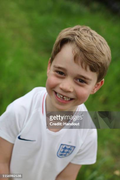 In this undated handout photo released by the Duke and Duchess of Cambridge, Prince George of Cambridge is photographed recently in the garden of...