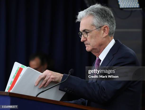 Federal Reserve Board Chairman Jerome Powell prepares to speak during a news conference after the attending the Board’s two-day meeting, on June 19,...