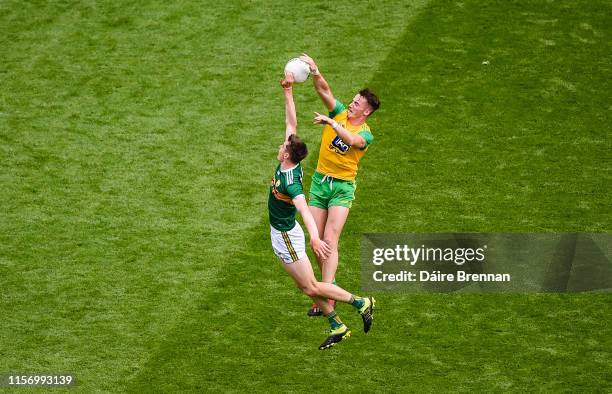 Dublin , Ireland - 21 July 2019; Jason McGee of Donegal in action against Adrian Spillane of Kerry during the GAA Football All-Ireland Senior...