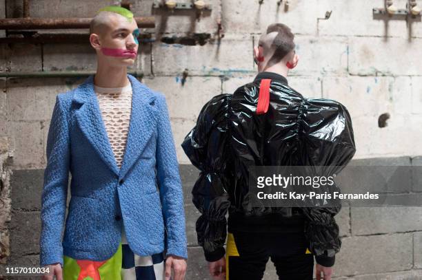 Models pose backstage prior the Walter Van Beirendonck Menswear Spring Summer 2020 show as part of Paris Fashion Week on June 19, 2019 in Paris,...
