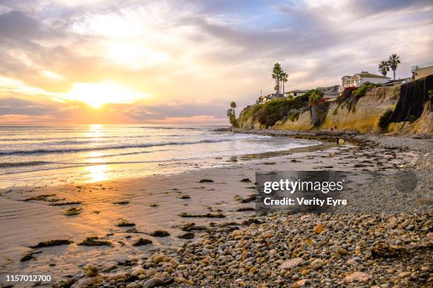 sunset at pacific beach, in san diego, california - san diego pacific beach stock pictures, royalty-free photos & images