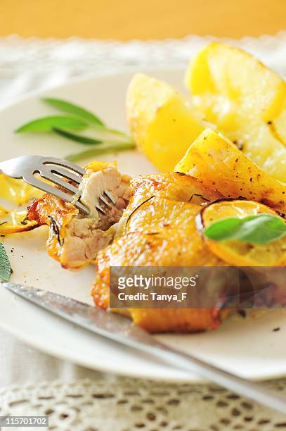roasted chicken lunch with vegetables - lemon chicken stock pictures, royalty-free photos & images