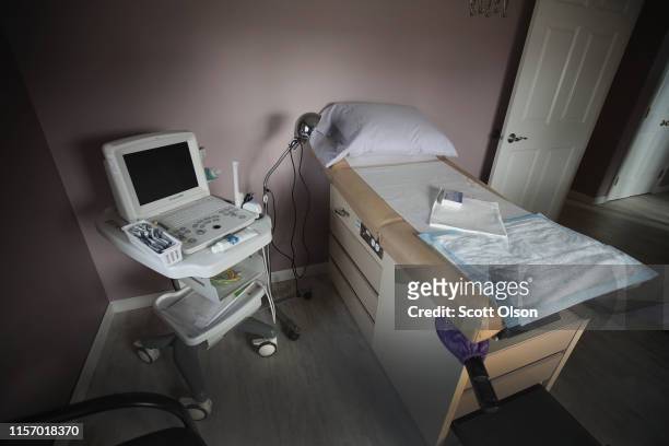 An ultrasound machine sits next to an exam table in an examination room at Whole Woman's Health of South Bend on June 19, 2019 in South Bend,...