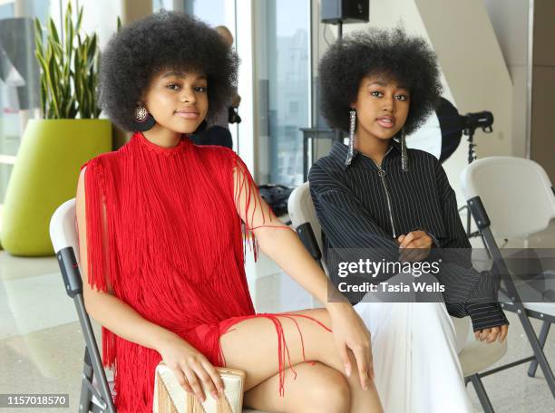 Briana Roy and Jenasha Roy attend the Sebastian Gunawan Couture Homecoming Runway Show at LAX Airport on June 18, 2019 in Los Angeles, California.