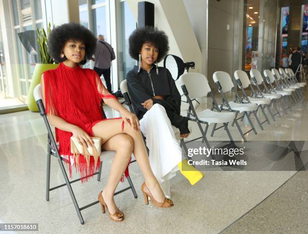 Briana Roy and Jenasha Roy attend the Sebastian Gunawan Couture Homecoming Runway Show at LAX Airport on June 18, 2019 in Los Angeles, California.