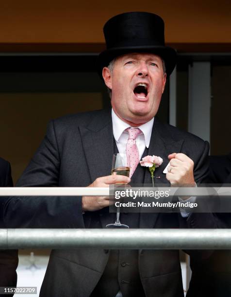 Piers Morgan cheers whilst watching the racing on day two of Royal Ascot at Ascot Racecourse on June 19, 2019 in Ascot, England.