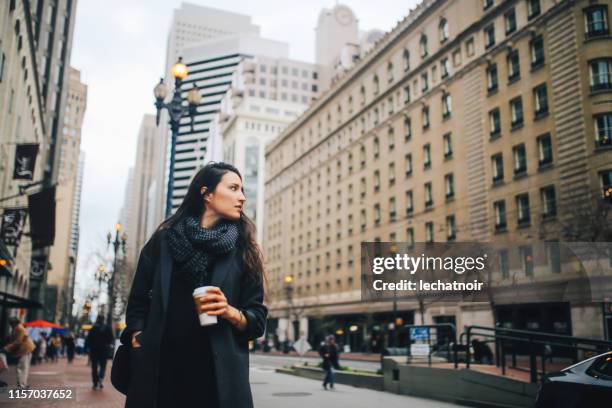 young commuter woman in downtown san francisco, california - silicon valley people stock pictures, royalty-free photos & images