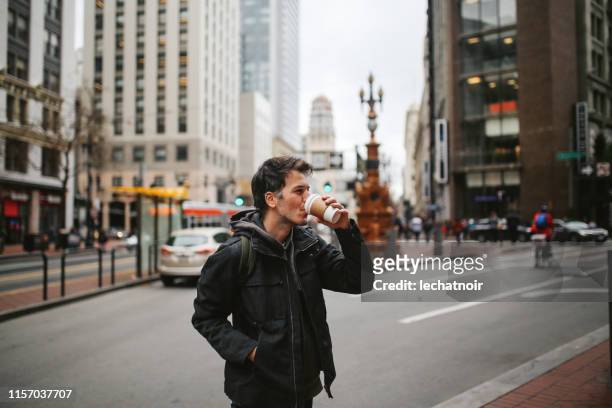 young it professional on a coffee break in san francisco, california - daily life in silicon valley stock pictures, royalty-free photos & images