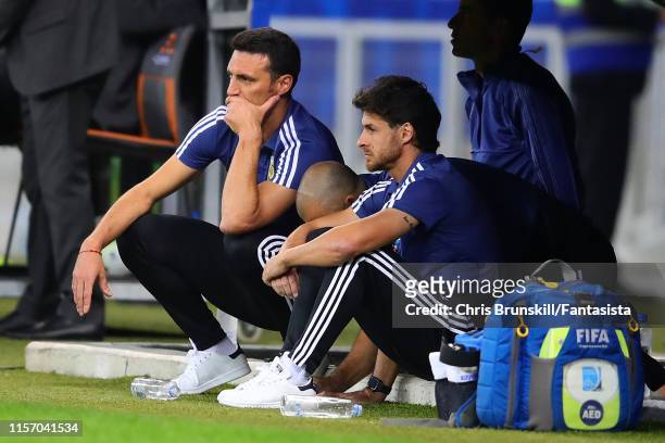 Argentina coach Lionel Scaloni looks on next to assistant Pablo Aimar during the Copa America Brazil 2019 group B match between Argentina and...