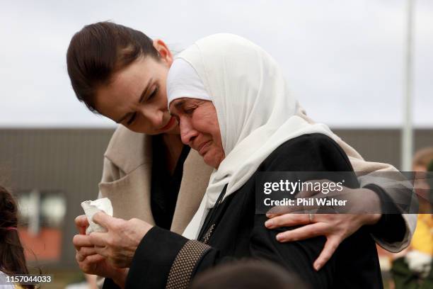 New Zealand Prime Minister Jacinda Ardern consoles Nadia Stas who lost her son in law and a grandchild in the Christchurch terror attacks as the...