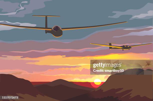 gliders over countryside - glider stock illustrations