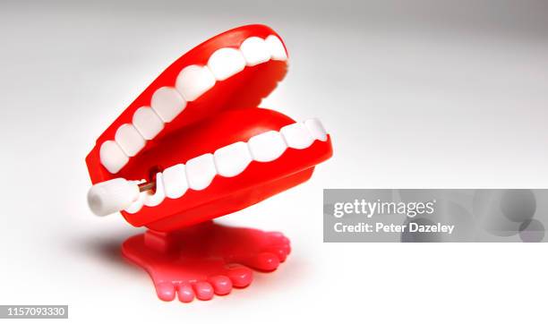 joke teeth on white - dentures stock pictures, royalty-free photos & images