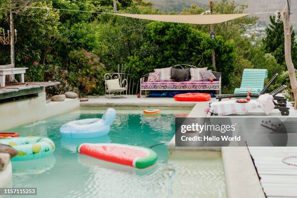 fun looking pool and poolside - swimming pool no people stock pictures, royalty-free photos & images