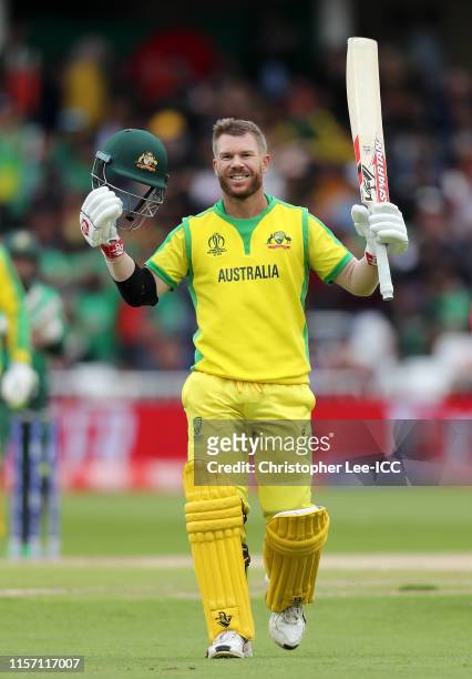 David Warner of Australia celebrates his century during the Group Stage match of the ICC Cricket World Cup 2019 between Australia and Bangladesh at...
