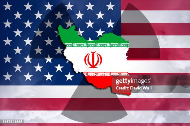 iran american tension concept. the country of iran with the radioactive symbol and american flag behind. - iran us stock pictures, royalty-free photos & images