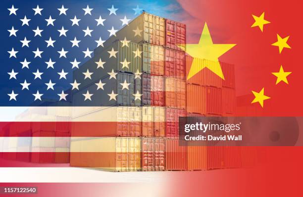 the american and chinese flags imposed over containers representing trade between the two countries. - america economy stockfoto's en -beelden