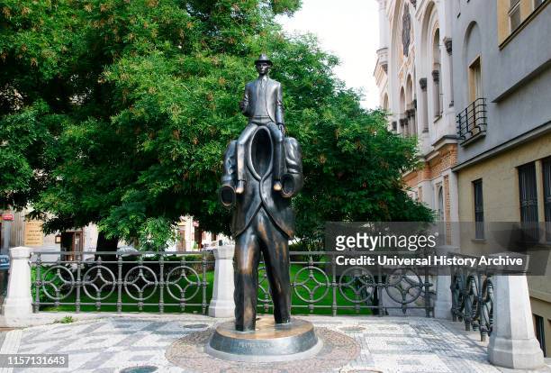 Franz Kafka . German Jewish novelist. Sculpture by Jaroslav Rona , inspired by Kafka's short story 'Description of a Struggle'. It is located in...