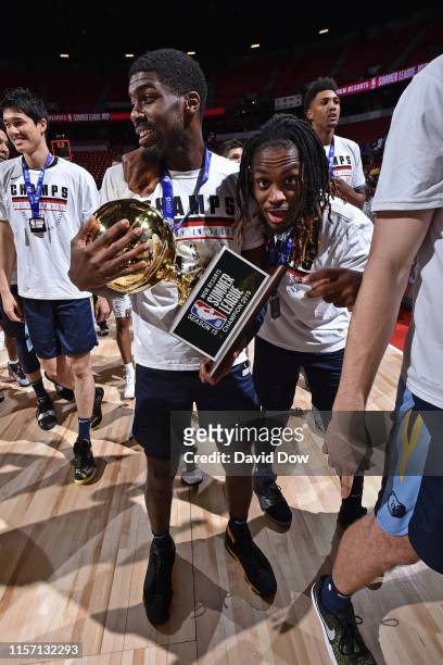 Memphis Grizzlies are presented with the MGM Resorts Summer League Championship trophy after winning the game against the the Minnesota Timberwolves...
