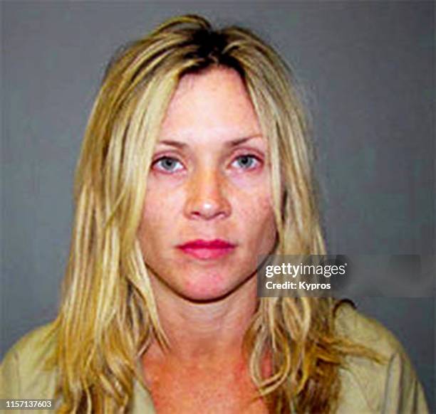 In this handout, American actress Amy Locane in a mug shot following her arrest for driving under the influence, Somerset County Jail, Somerville,...