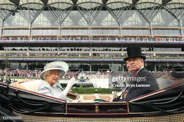 Queen Elizabeth II waves as she arrives on Ladies Day on day three of Royal Ascot at Ascot Racecourse on June 20, 2019 in Ascot, England.