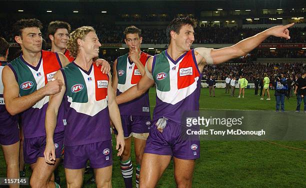 Andrew Siegert, Shaun McManus and Matthew Pavlich for the Dockers celebrates their win after the round 16 AFL match between the Fremantle Dockers and...