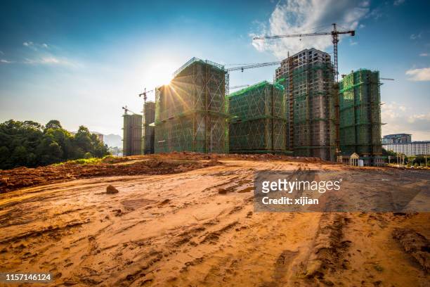building - construction crane asia stock pictures, royalty-free photos & images