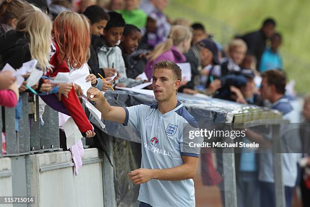 Jordan Henderson signs autographs after the England U21's training session at Montjasa Park Stadium on June 9, 2011 in Fredericia, Denmark.