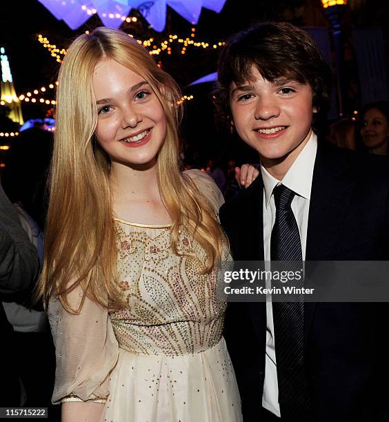 Actors Elle Fanning and Joel Courtney pose at the after party for the premiere of Paramount Pictures' "Super 8" at the Village Theater on June 8,...