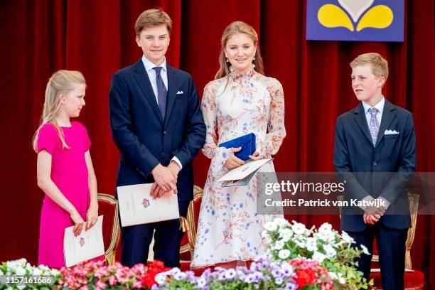 Princess Elisabeth of Belgium, Prince Gabriel of Belgium, Prince Emmanuel of Belgium and Princess Eleonore of Belgium attend the military parade...