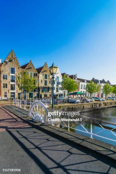 zeeland, middelburg, old town, canal and bridge - middelburg netherlands stock pictures, royalty-free photos & images