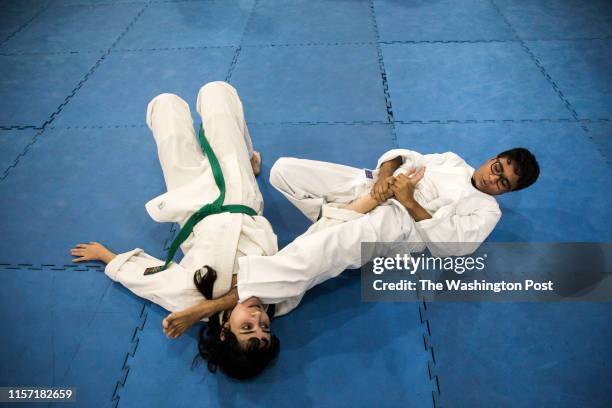 Pollyana Labre and Miguel Doldan training Krav Maga techniques at the Fight Training Center in Rio de Janeiro, Brazil. They are members of the...