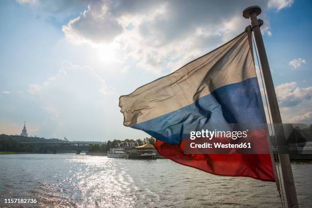 russia, moscow, river cruise along the moskva - russian flag stockfoto's en -beelden