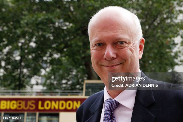 Britain's Transport Secretary Chris Grayling arrives at the Cabinet Office on Whitehall in central London on July 22, 2019 ahead of a meeting of...