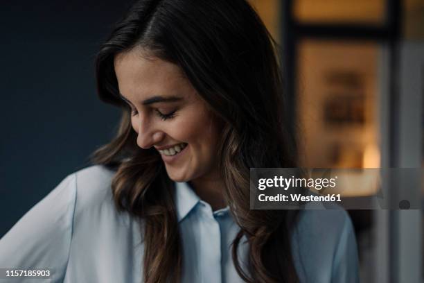 portrait of happy young businesswoman - shy fotografías e imágenes de stock