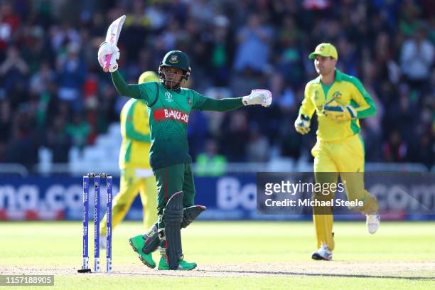 Mushfiqur Rahim of Bangladesh celebrates reaching his century during the Group Stage match of the ICC Cricket World Cup 2019 between Australia and...
