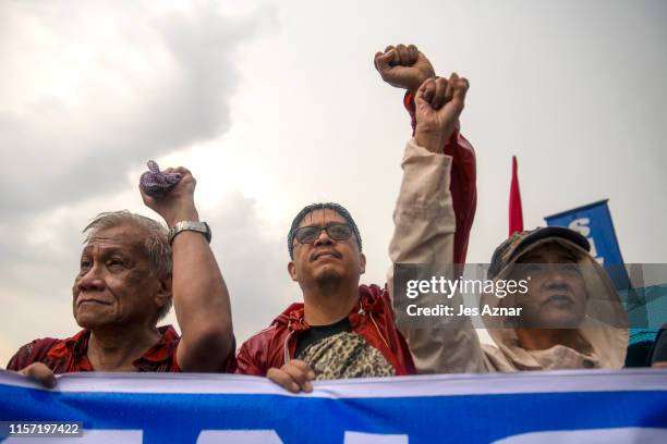 Protesters march towards the area of the Philippine Congress on July 22, 2019 in Manila, Philippines. Filipino protesters rallied on the streets on...