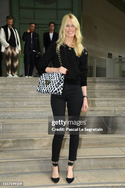 Claudia Schiffer poses prior the Karl Lagerfeld Hommage at Grand Palais on June 20, 2019 in Paris, France.